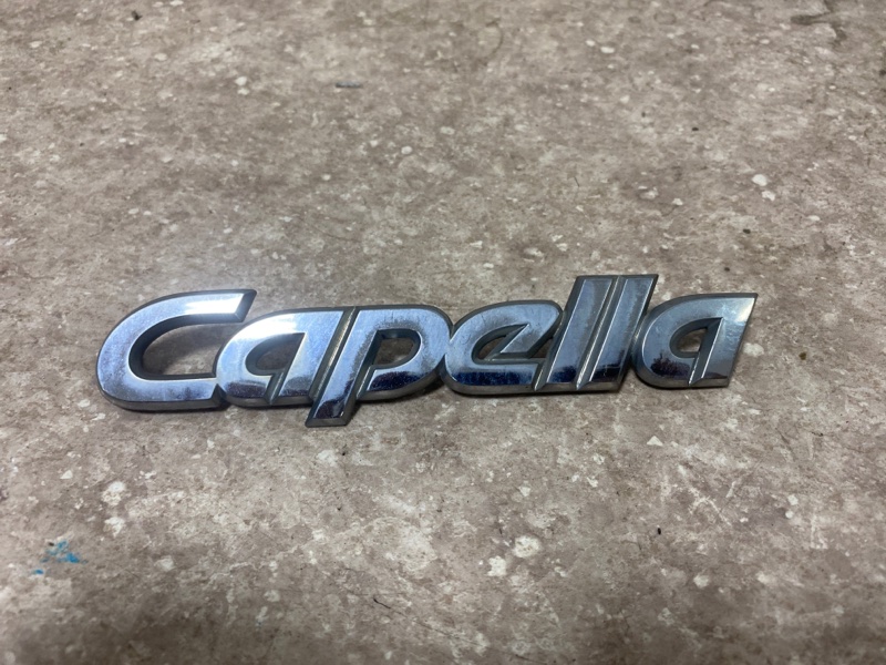 Эмблема Mazda Capella GW8W FP-DE 11.1997