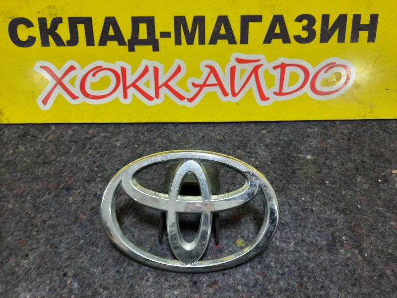 Эмблема Toyota Voxy AZR60G 1AZ-FSE 08.2004 передняя