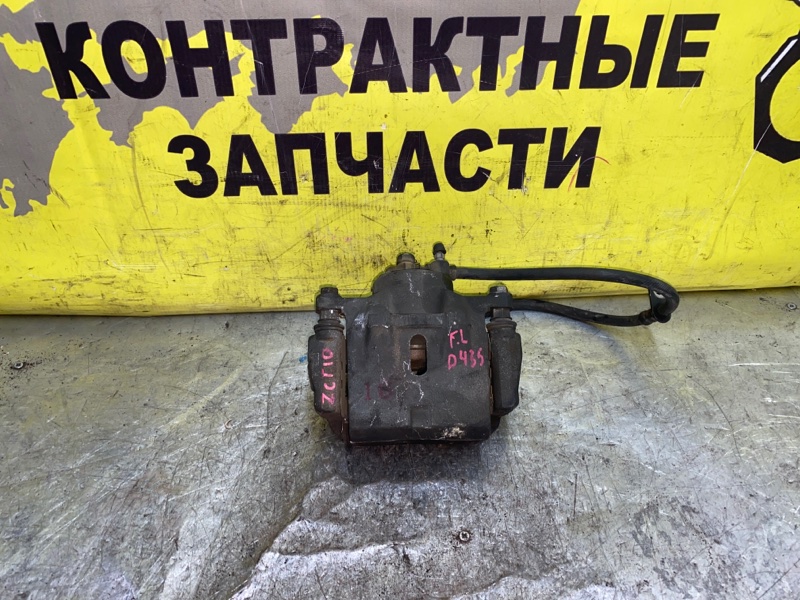 Суппорт Toyota Opa ZCT10 1ZZ-FE 05.2000 передний левый
