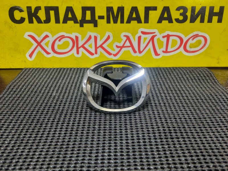 Эмблема Mazda Capella GFEP FS 11.1997 передняя левая