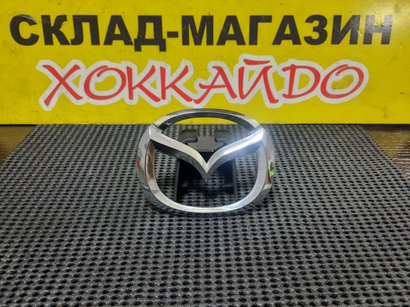Эмблема Mazda Demio DW5W B5E 12.1999 задняя