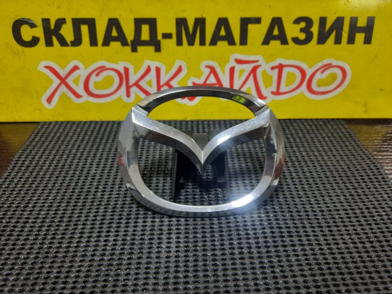 Эмблема Mazda Bongo SK82V F8 06.1999 передняя