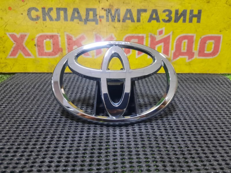 Эмблема Toyota Probox NCP58 1NZ-FE 09.2014 передняя