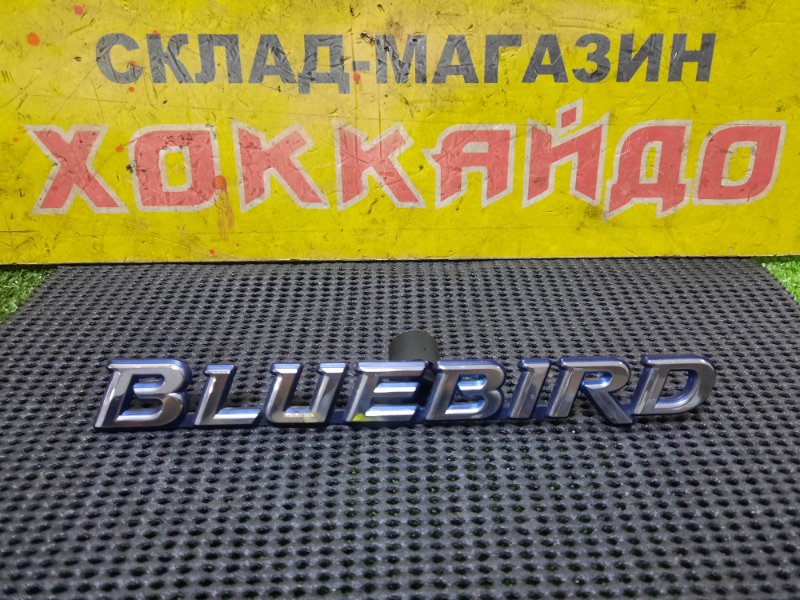 Эмблема Nissan Bluebird EU14 SR20DE 09.1998 задняя