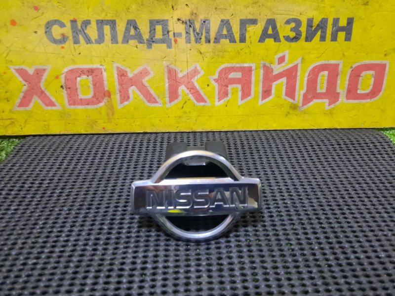 Эмблема Nissan Almera N16 QG15DE 10.2002 задняя