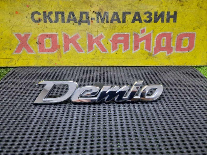 Эмблема Mazda Demio DY3W ZJ-VE 08.2002 задняя