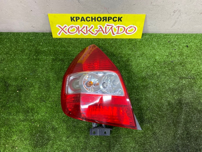 Фонарь стоп-сигнала Honda Fit GD1 L13A 06.2001 задний левый