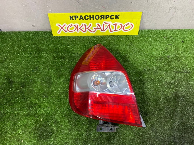 Фонарь стоп-сигнала Honda Fit GD1 L13A 06.2001 задний левый