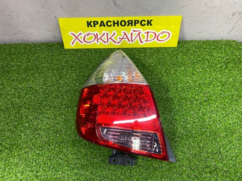 Фонарь стоп-сигнала Honda Fit GD1 L13A 06.2004 задний левый