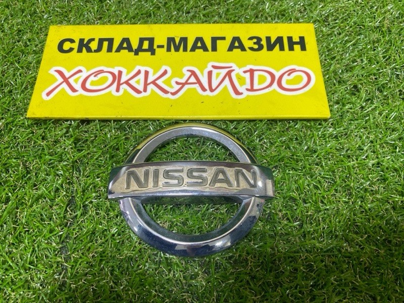 Эмблема Nissan Moco MG22S K6A 2010 передняя