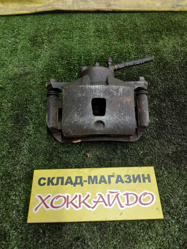 Суппорт Nissan March AK12 CR12DE 02.2002 передний левый (б/у)