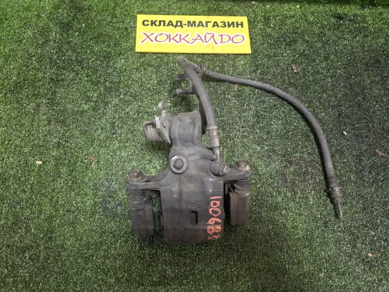 Суппорт Nissan Primera WHP11 SR20DE 09.1997 задний левый (б/у)