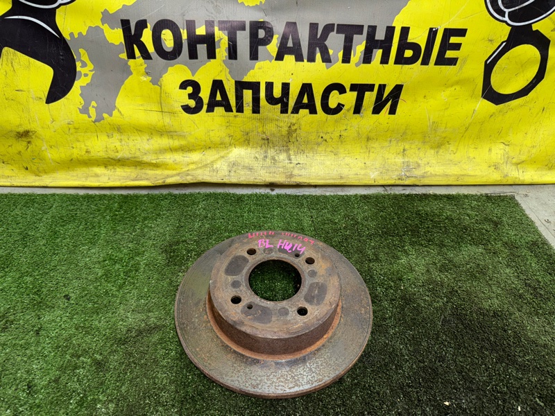 Диск тормозной Nissan Bluebird HU14 SR20DE 01.1996 задний (б/у)