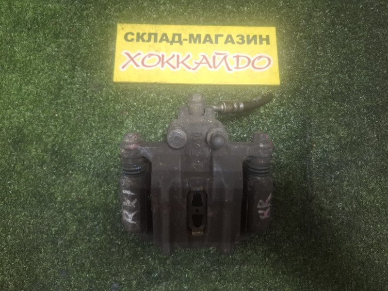 Суппорт Honda Stepwgn RK1 R20A 10.2009 задний правый (б/у)