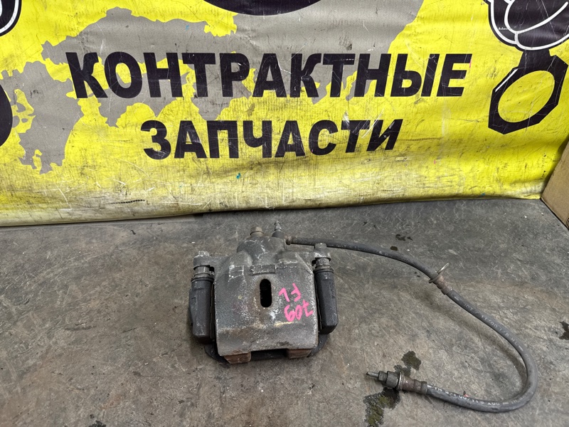 Суппорт Toyota Funcargo NCP20 2NZ-FE 08.1999 передний левый (б/у)