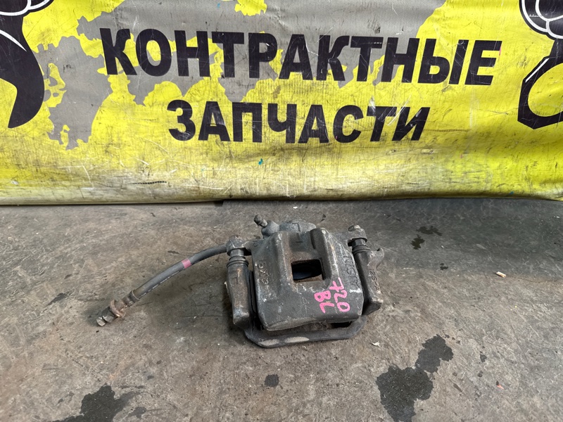 Суппорт Toyota Ipsum ACM26W 2AZ-FE 05.2001 задний левый (б/у)