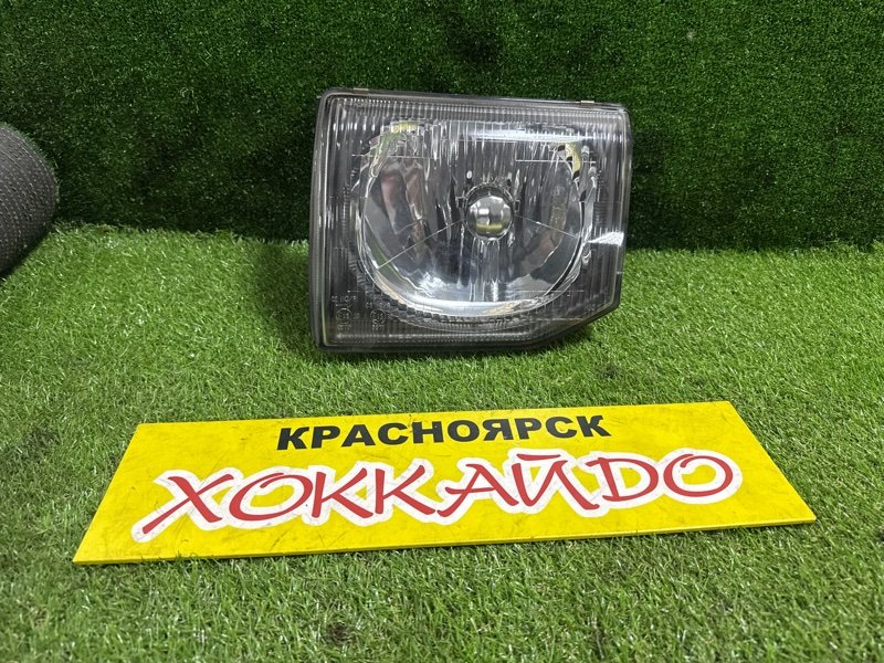 Фара Mitsubishi Pajero V45W 6G72 01.1991 передняя левая (б/у) Фара Mitsubishi Pajero V45W 6G72 01.1991 передняя левая (б/у)