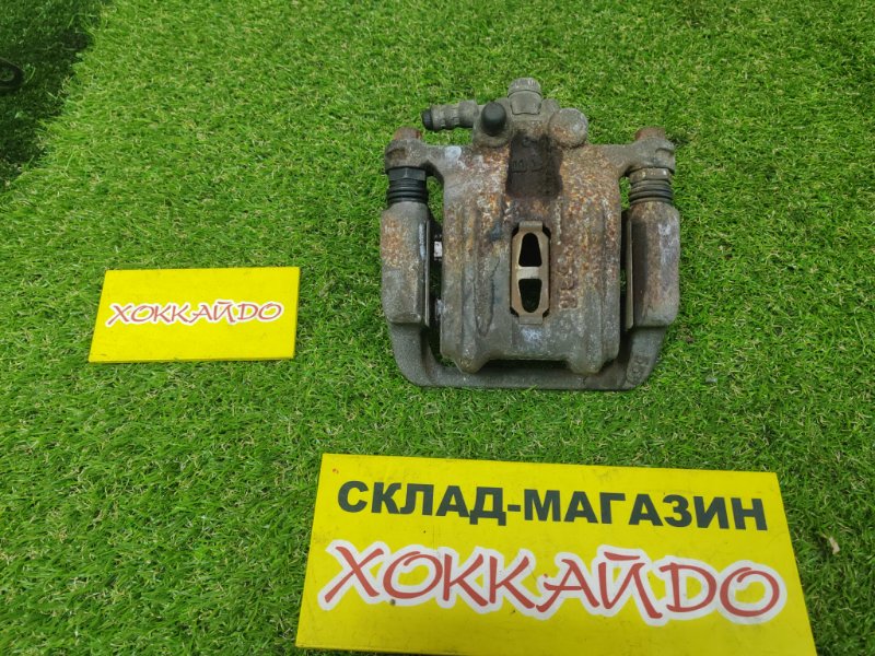 Суппорт Honda Odyssey RA3 F23A 10.1994 задний левый (б/у) Суппорт Honda Odyssey RA3 F23A 10.1994 задний левый (б/у)