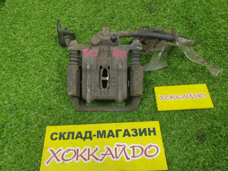 Суппорт Honda Odyssey RA3 F23A 10.1994 задний правый (б/у) Суппорт Honda Odyssey RA3 F23A 10.1994 задний правый (б/у)