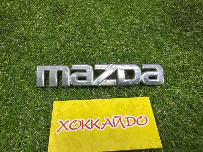 Эмблема Mazda Axela BKEP LF-DE 10.2003 задняя (б/у)