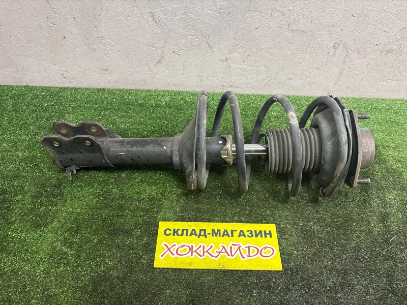 Стойка подвески Nissan Avenir PW11 SR20DE 05.2000 передняя левая (б/у)