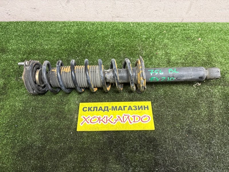 Стойка подвески Toyota Raum EXZ10 5E-FE 08.1999 задняя левая (б/у)