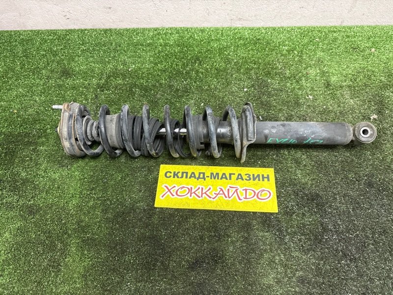 Стойка подвески Toyota Raum EXZ10 5E-FE 08.1999 задняя левая (б/у)