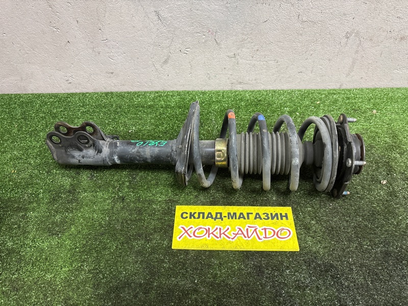 Стойка подвески Toyota Raum EXZ10 5E-FE 08.1999 передняя левая (б/у)