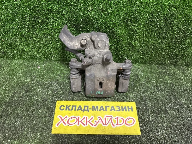 Суппорт Nissan Avenir PW11 SR20DE 05.2000 задний левый (б/у)