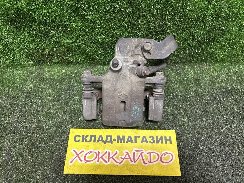 Суппорт Nissan Avenir PW11 SR20DE 05.2000 задний правый (б/у)