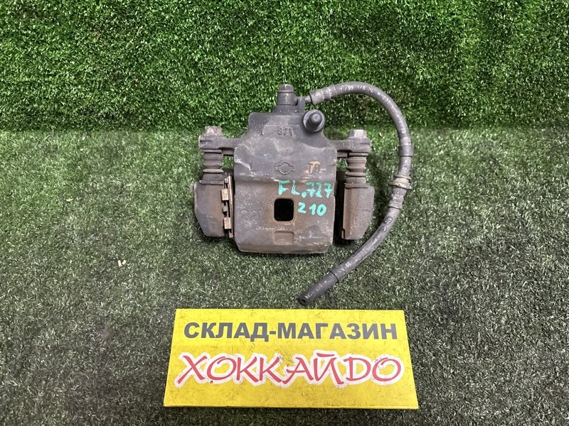 Суппорт Nissan Cube Z10 CG13DE 02.1998 передний левый (б/у)