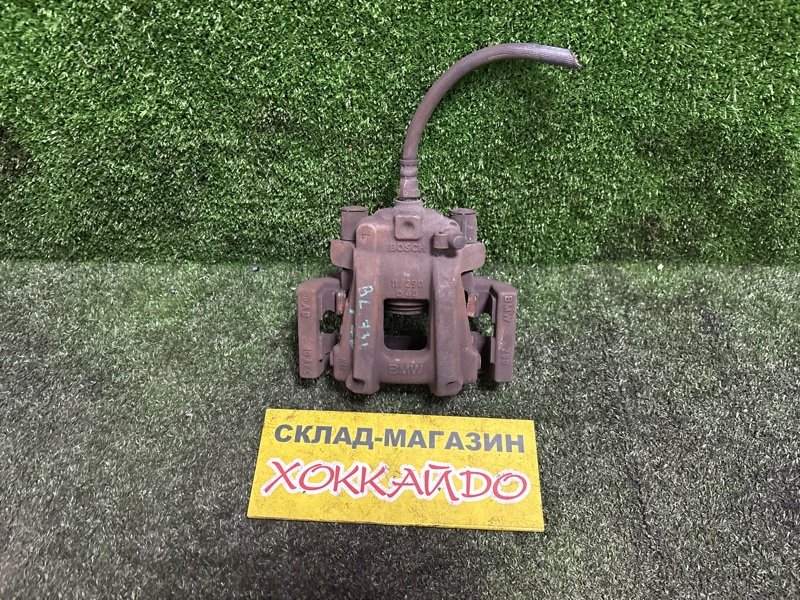 Суппорт BMW 1-SERIES F20 N13B16A 10.2011 задний левый (б/у)