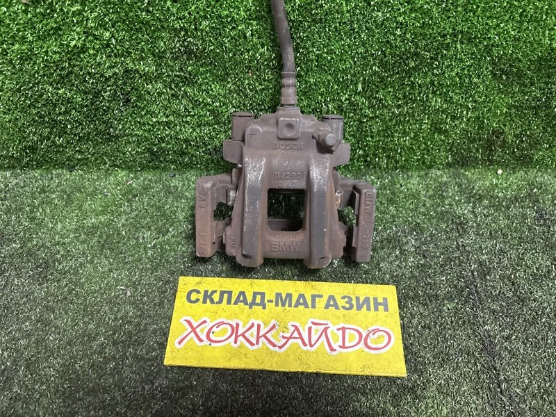 Суппорт BMW 1-SERIES F20 N13B16A 10.2011 задний левый (б/у)