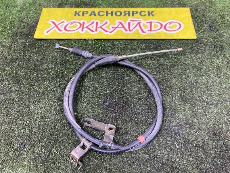 Трос ручника Mazda Familia S-Wagon BJ5W ZL-VE 10.2000 задний левый (б/у)