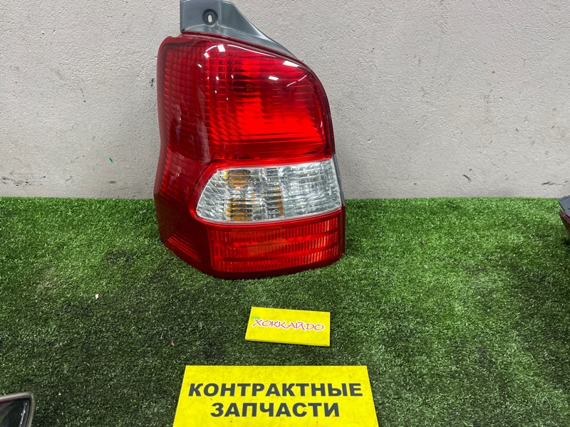 Фонарь стоп-сигнала Mazda Demio DW5W B5E 12.1999 задний левый (б/у)