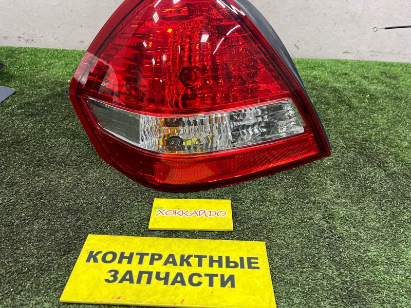 Фонарь стоп-сигнала Nissan Tiida Latio SC11 HR15DE 01.2008 задний левый (б/у)