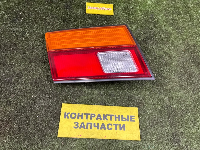 Фонарь вставка багажника Nissan Sunny FB14 GA15DE 09.1995 задний левый (б/у)