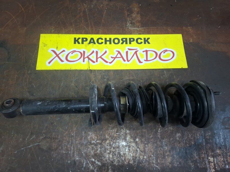 Стойка подвески Nissan Sunny FB14 GA15DE 09.1995 задняя левая (б/у)