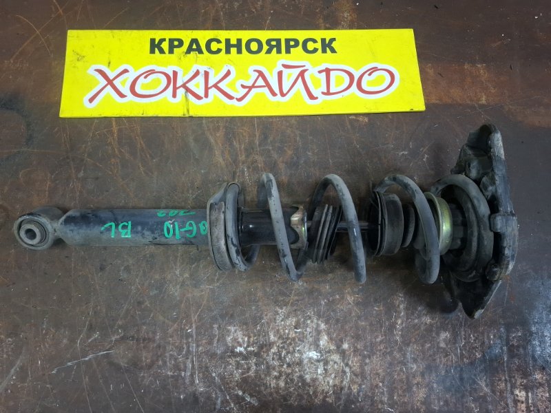 Стойка подвески Nissan Bluebird Sylphy QG10 QG18DE 02.2003 задняя левая (б/у)