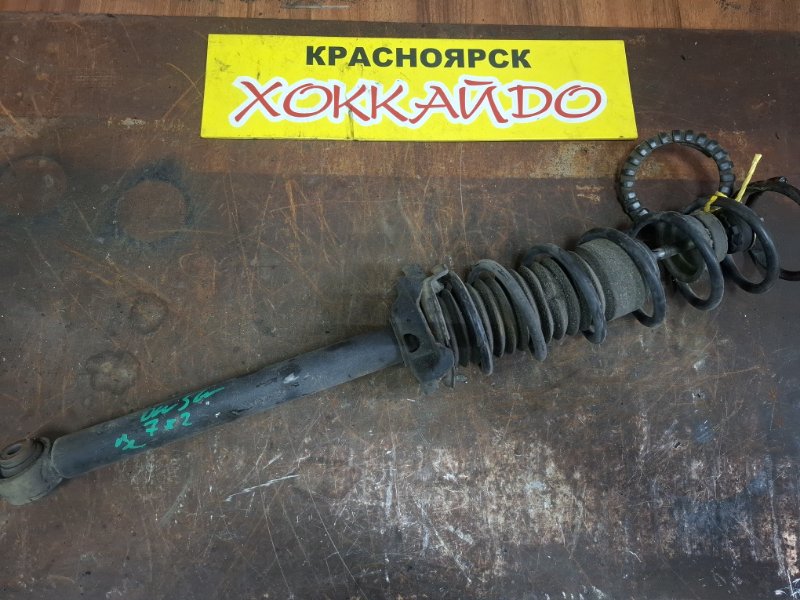 Стойка подвески Mazda Demio DW5W B5E 12.1999 задняя левая (б/у)