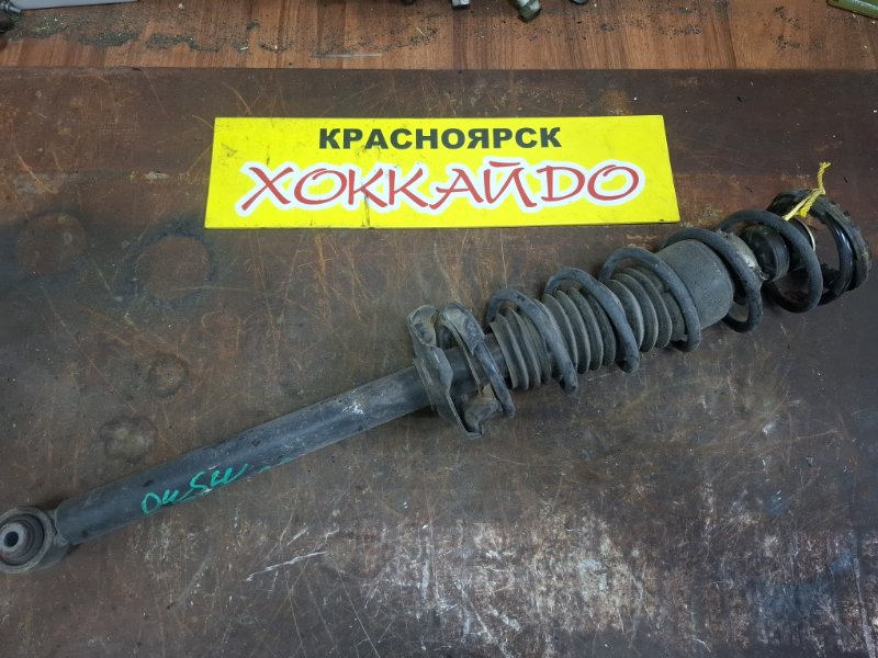 Стойка подвески Mazda Demio DW5W B5E 12.1999 задняя правая (б/у)