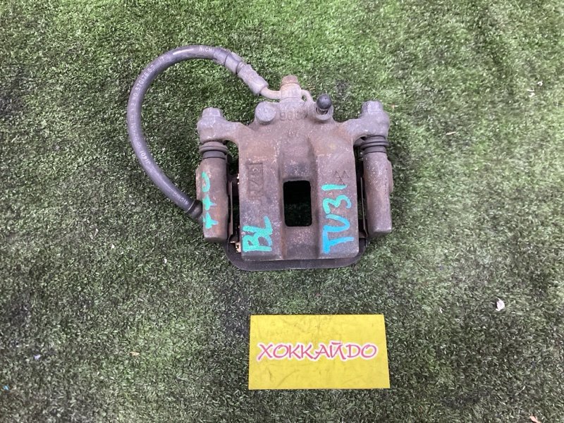 Суппорт Nissan Presage TU31 QR25DE 06.2003 задний левый (б/у)