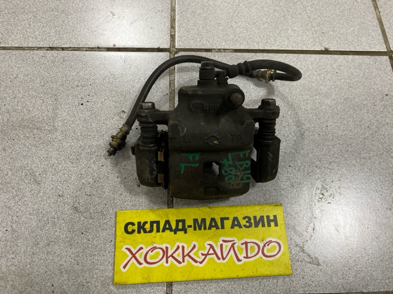 Суппорт Nissan Sunny FB14 GA15DE 09.1995 передний левый (б/у)