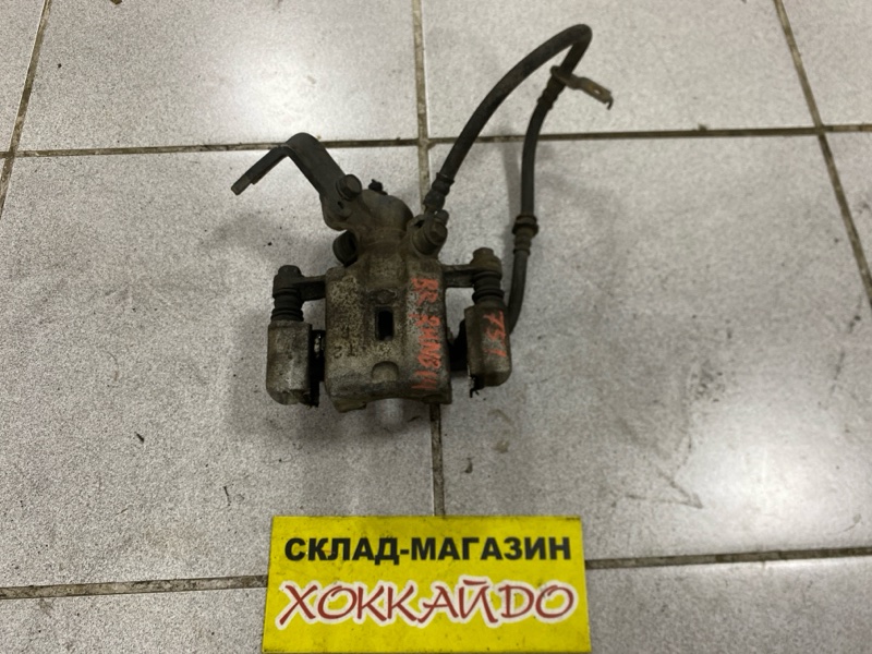 Суппорт Nissan Rasheen RHNB14 SR18DE 12.1994 задний правый (б/у)