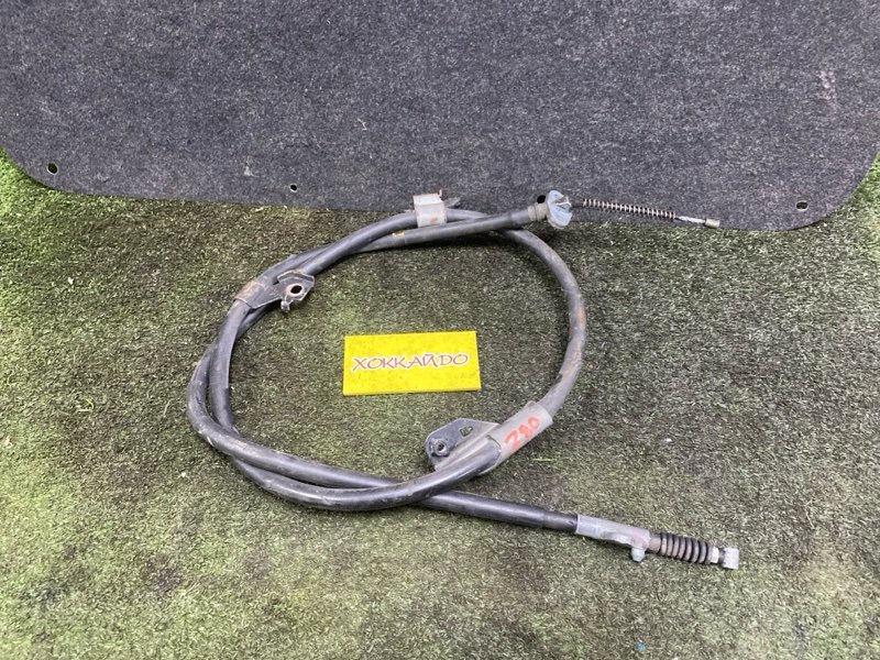 Трос ручника Nissan Sunny FB14 GA15DE 09.1995 задний левый (б/у)