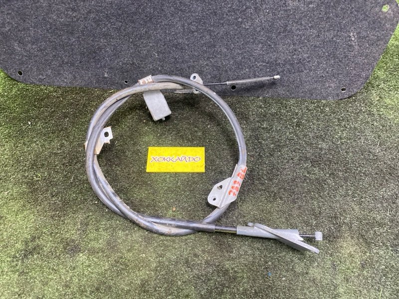 Трос ручника Nissan Bluebird Sylphy QG10 QG18DE 02.2003 задний левый (б/у)