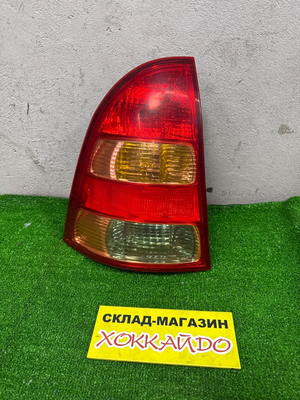 Фонарь стоп-сигнала Toyota Corolla Fielder NZE121G 1NZ-FE 09.2002 левый (б/у)