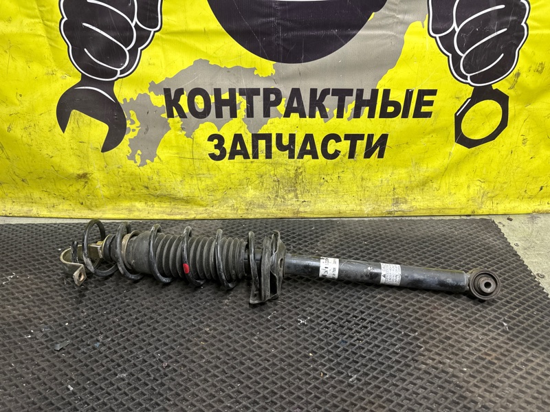 Стойка подвески Mazda Demio DW3W B3E 12.1999 задняя правая (б/у)