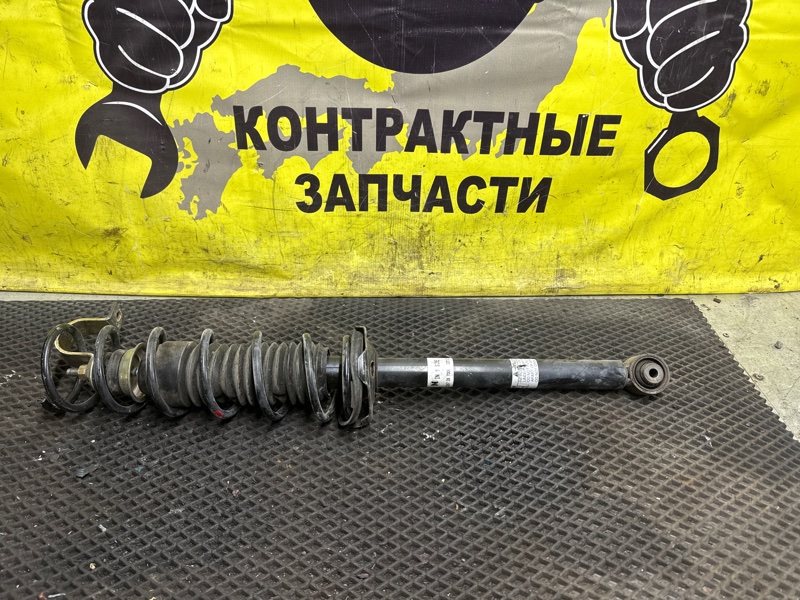 Стойка подвески Mazda Demio DW3W B3E 12.1999 задняя левая (б/у)