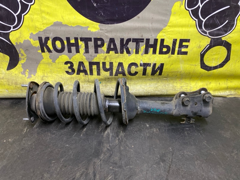 Стойка подвески Toyota Funcargo NCP20 2NZ-FE 08.2002 передняя левая (б/у)